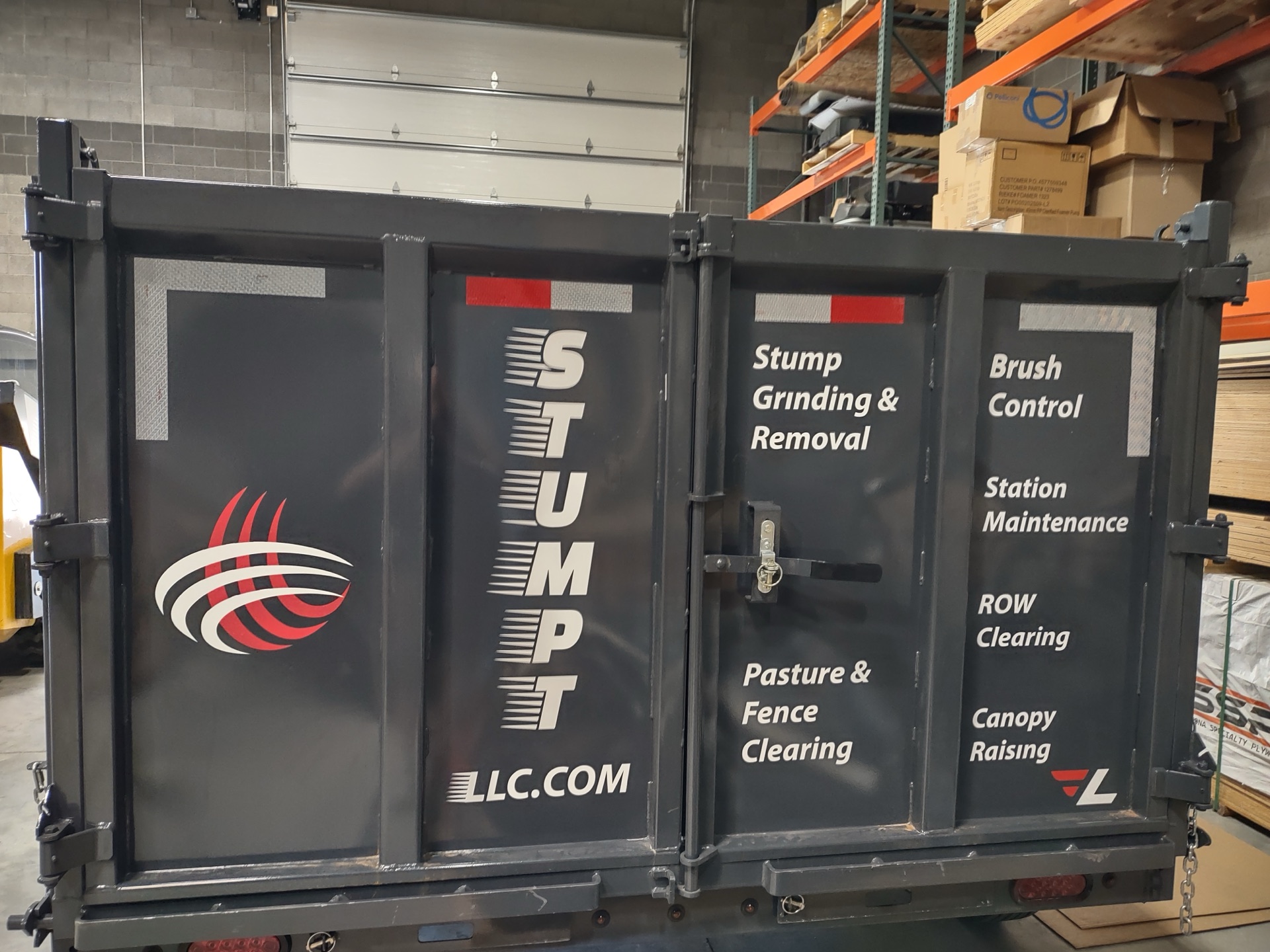 Stumpt LLC trailer rear panel with services list